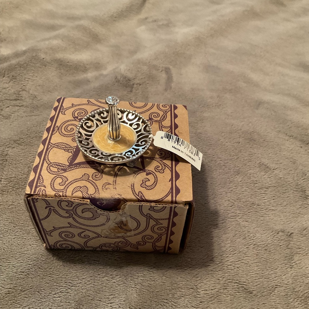 Brighton silver and gold enamel ring holder.